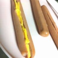 Example of how to slice hot dog for cheesy filling