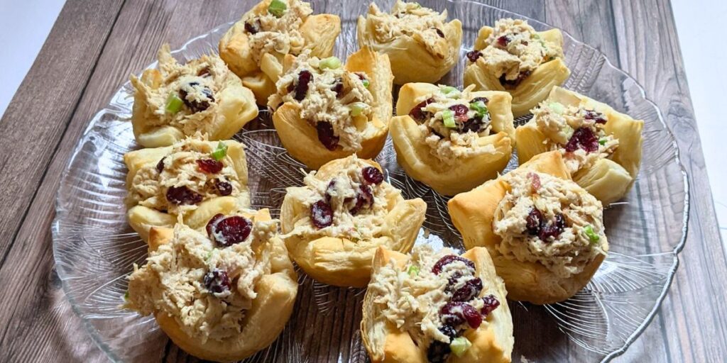 Puff pastry cups filled with chicken salad