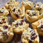 Puff pastry cups filled with chicken salad